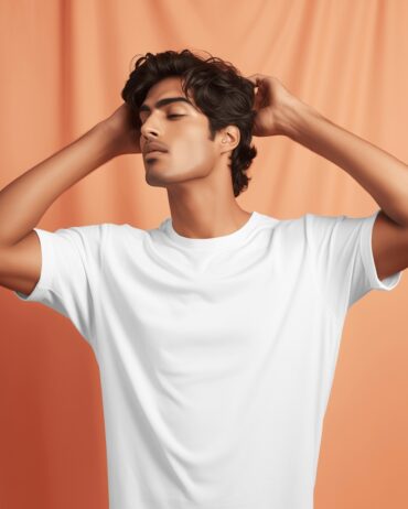 male-model-wearing-white-tshirt-posing-in-front-pink-curtain-00192